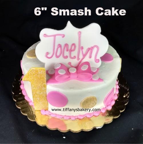 https://www.tiffanysbakery.com/cdn/shop/products/minnie_smash_cake_pink_6_inch.jpg?v=1541876131